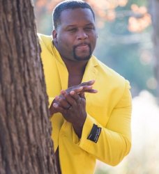Black guy hiding behind tree meme template